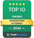 Badge announcing 'Top 10 Chicago Immigration Attorney 2024' awarded by TrustAnalytica.